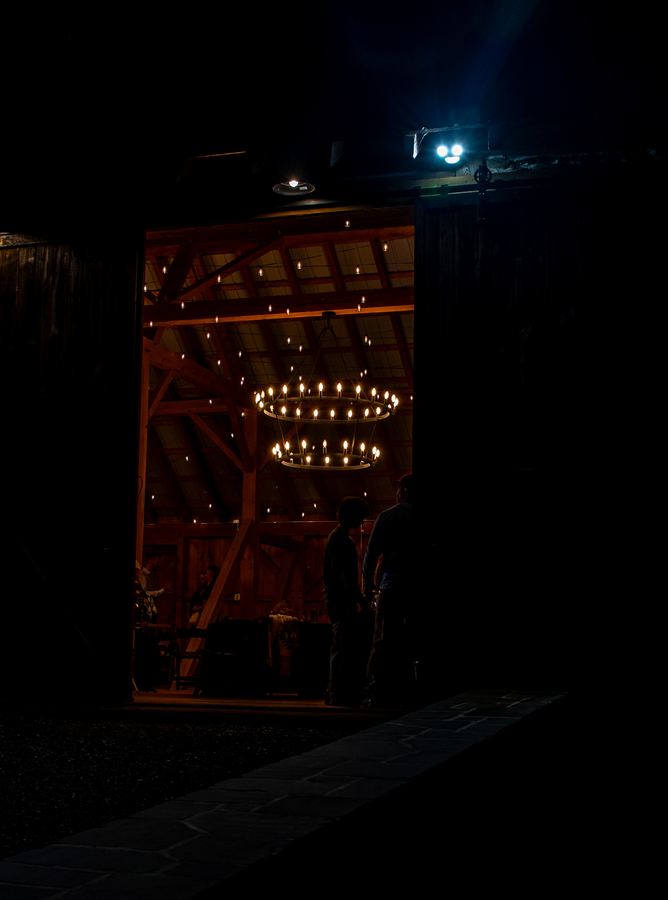 Looking into the barn at night