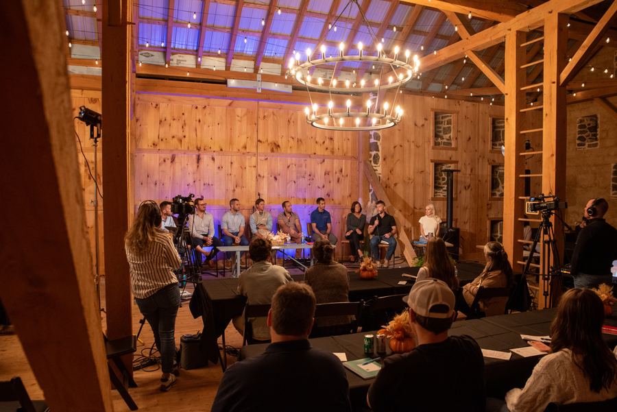 The student questions, seen from the back of the barn